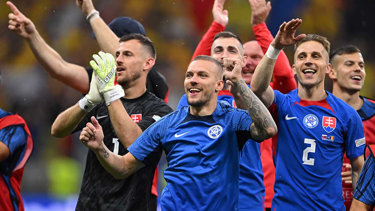 Slovakia celebrate after their win over Romania at EURO 2024